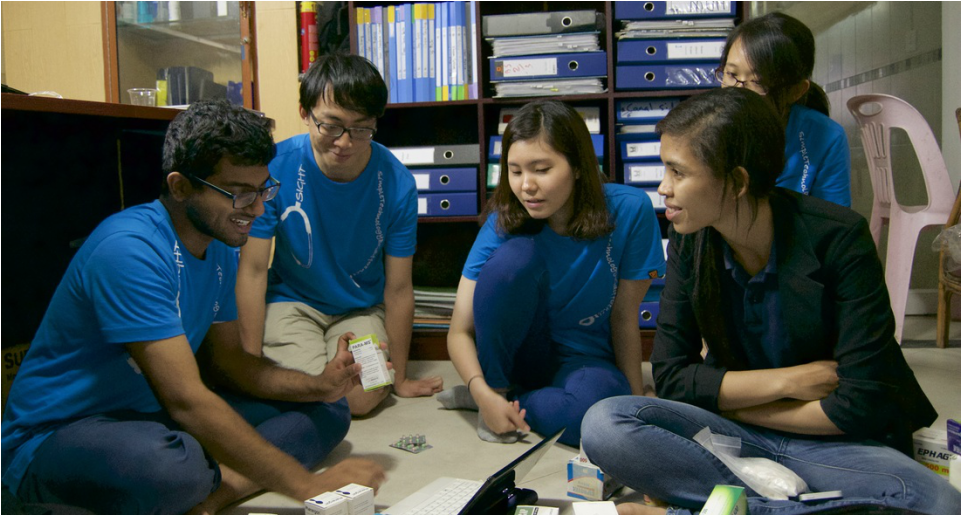 Students working with NGO staff